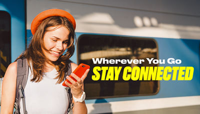 Girl smiling at phone